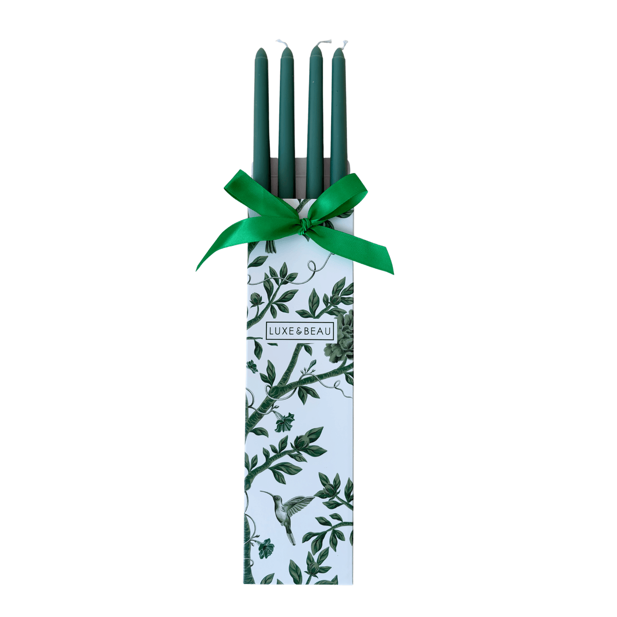 Set of four green taper candles in a Luxe and Beau gift box with green ribbon