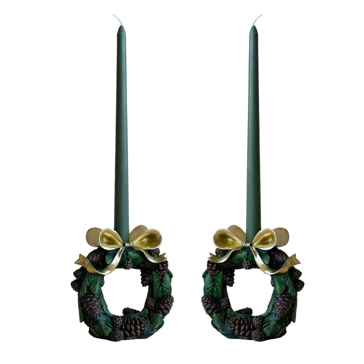 Pair of pinecone wreath candle holders with dark green taper candles