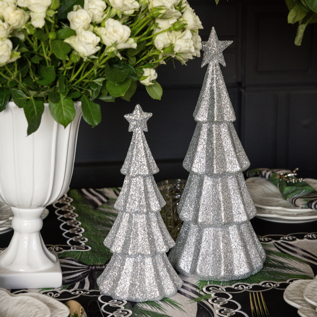 Spruce and Black Bow Christmas table styled with silver glitter Christmas trees