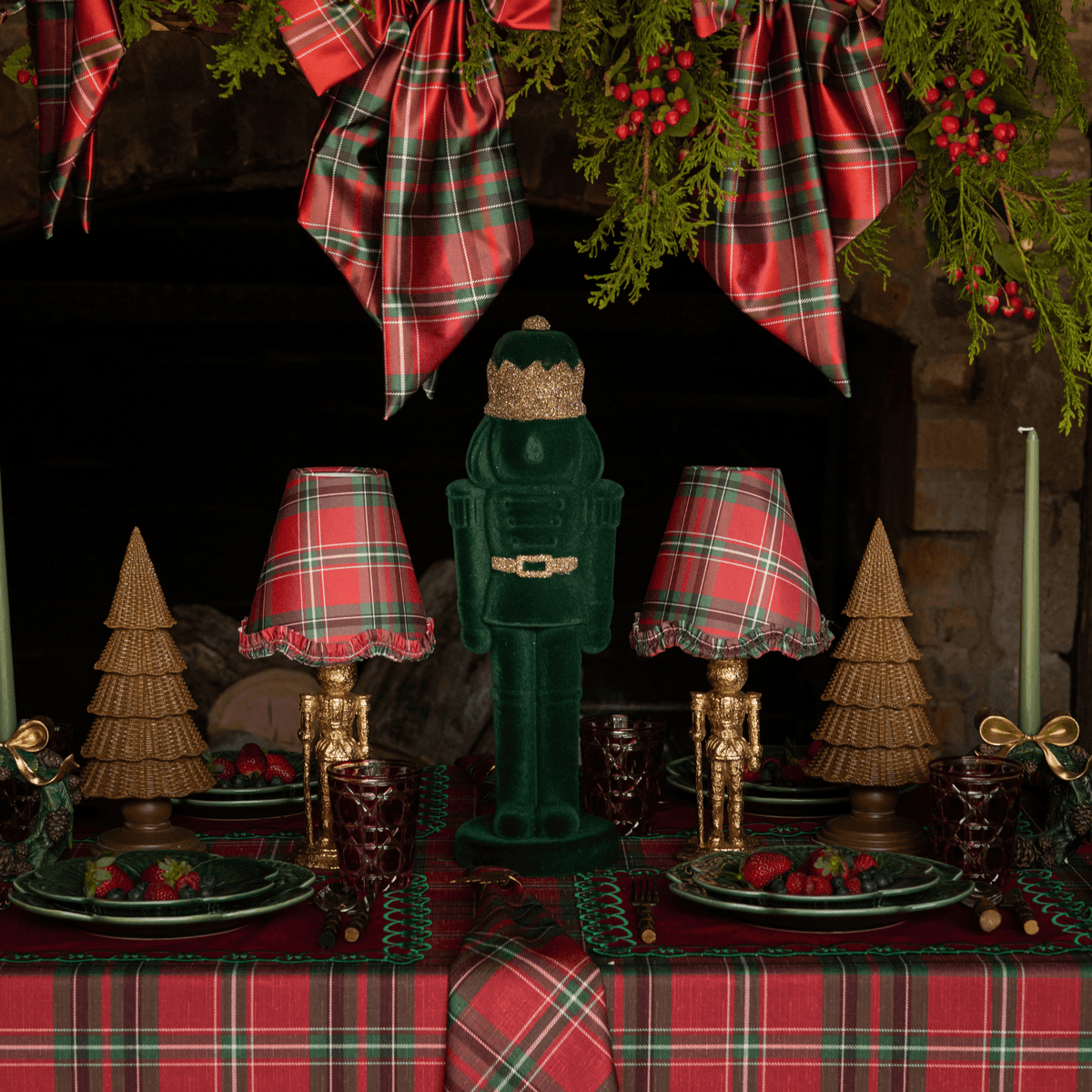 Red Tartan Christmas table styled with dark green velvet nutcracker, gold nutcracker lamp and Red Tartan ruffle lamp shade