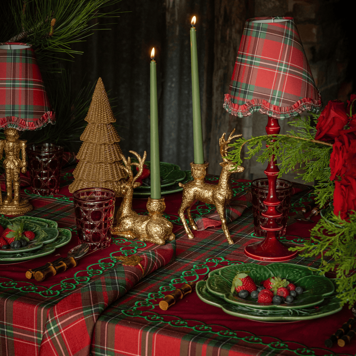 Red Tartan Christmas table styled with Red Tartan ruffle lamp shade, gold nutcracker lamp and Rouge lamp base