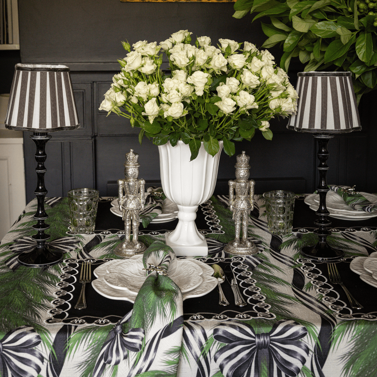 Spruce and Black Bow Christmas table styled with Spruce and Black Bow table cloth, Spruce and Black Bow napkins and black lamp base