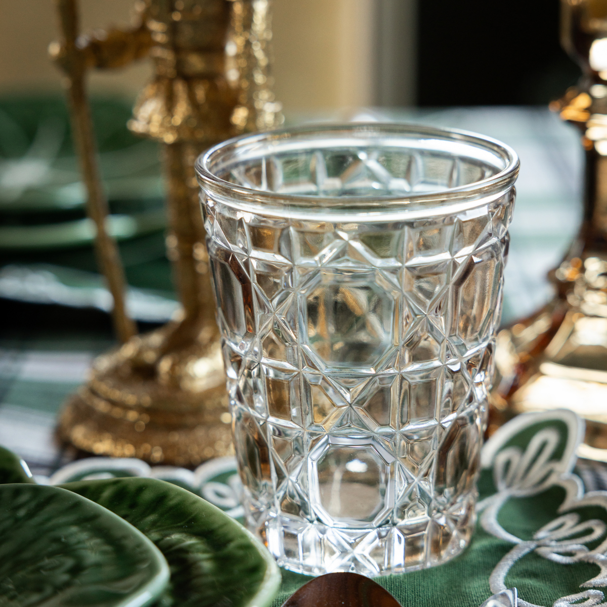 Green and Black Plaid Christmas table styled with mocha geometric glass tumblers