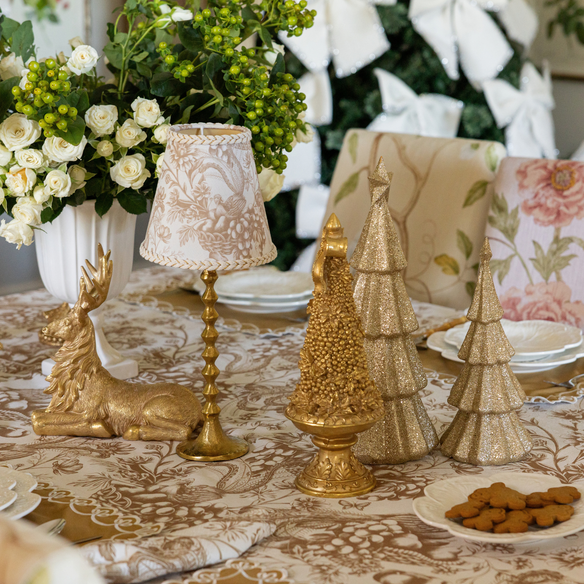 Gold Toile Christmas table styled with Gold Toile lamp shade and gold hammered lamp base