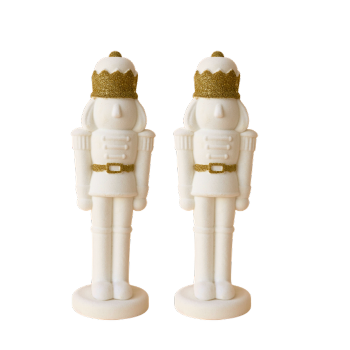 Pair of cream velvet nutcrackers with gold glitter crowns