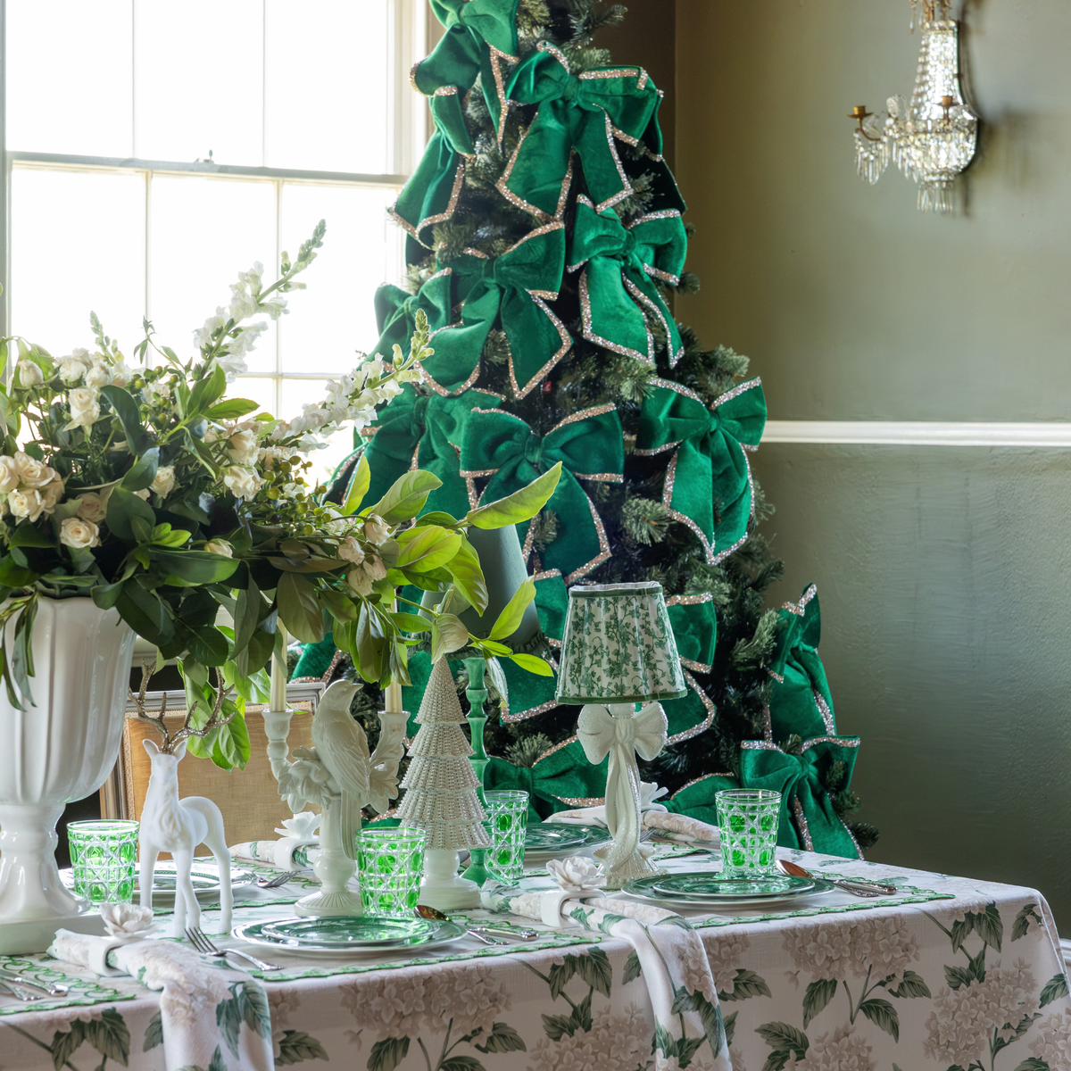 Cream Hydrangea Christmas table styled with Cream Hydrangea table cloth, Cream Hydrangea napkins and green velvet glitter trim bows