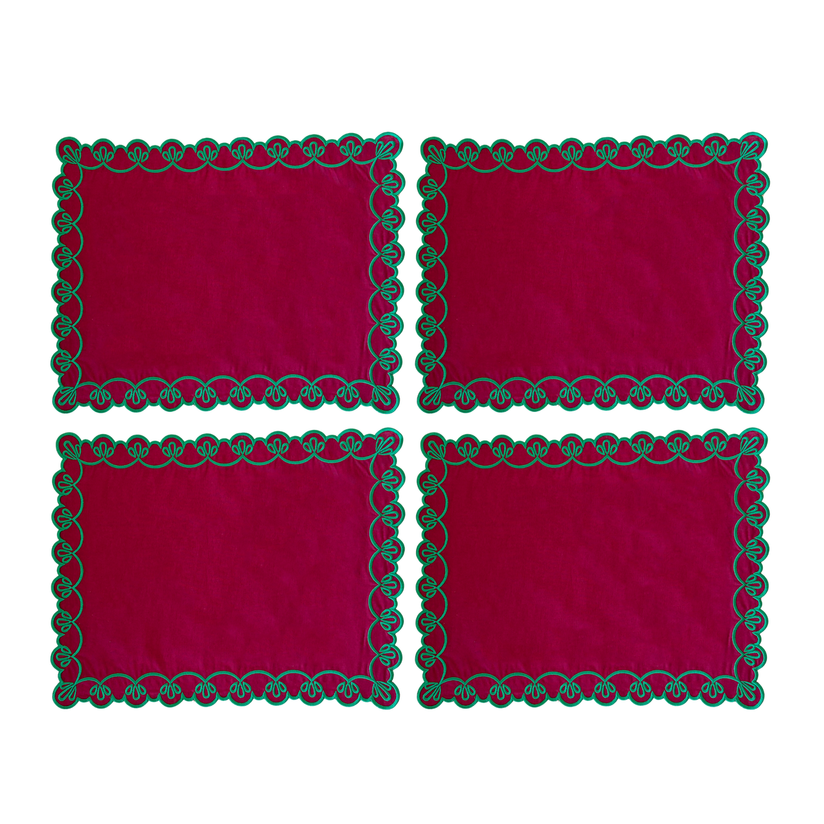 Set of four red placemats with green scallop embroidery