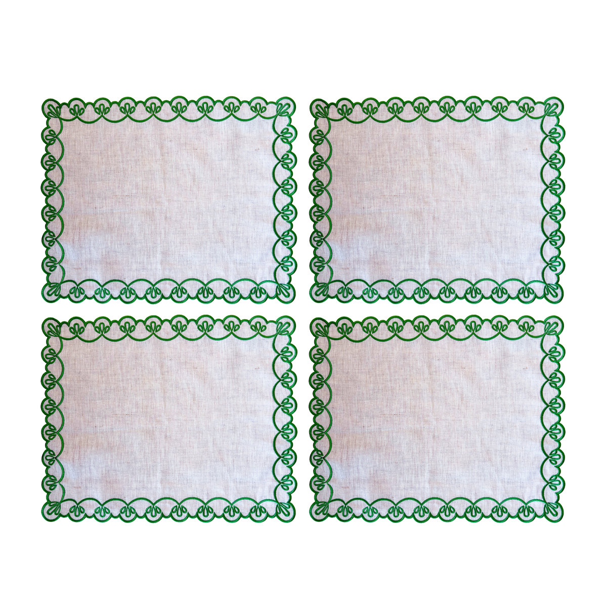 Set of four natural linen placemats with green scallop embroidery