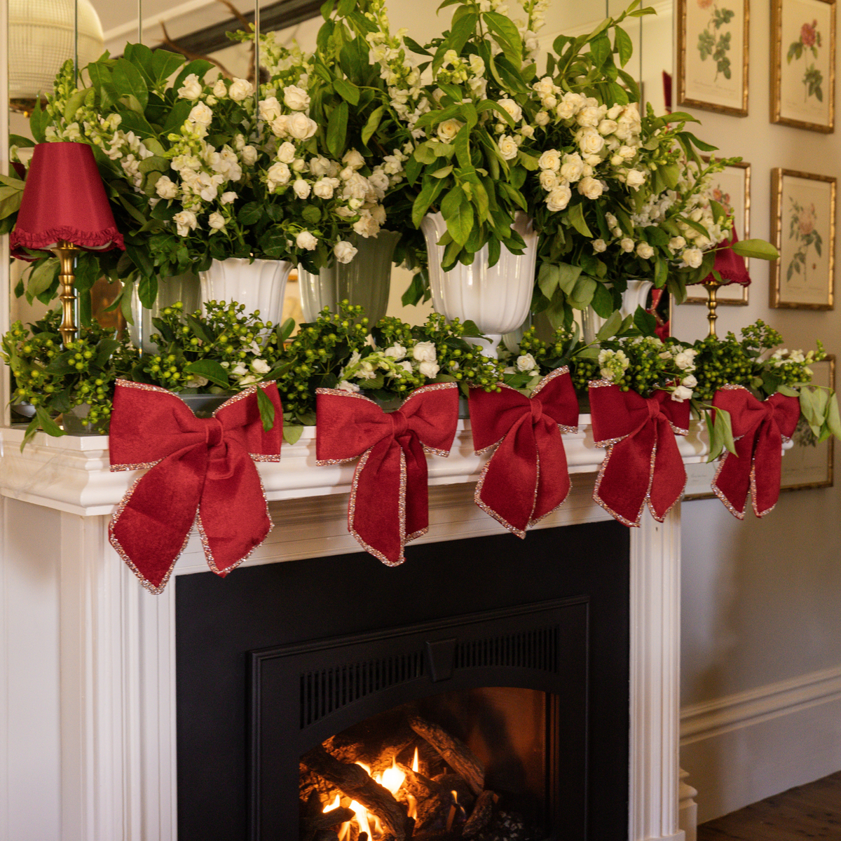 Pomegranate Christmas table styled with red velvet glitter trim bows