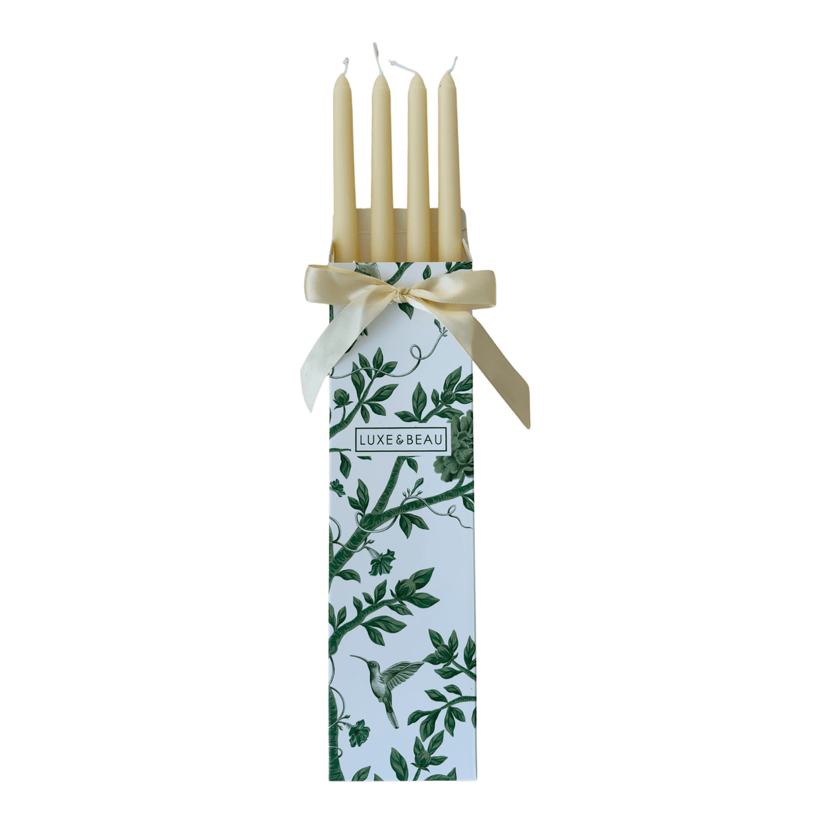 Set of four ivory taper candles in a Luxe and Beau gift box with ivory ribbon