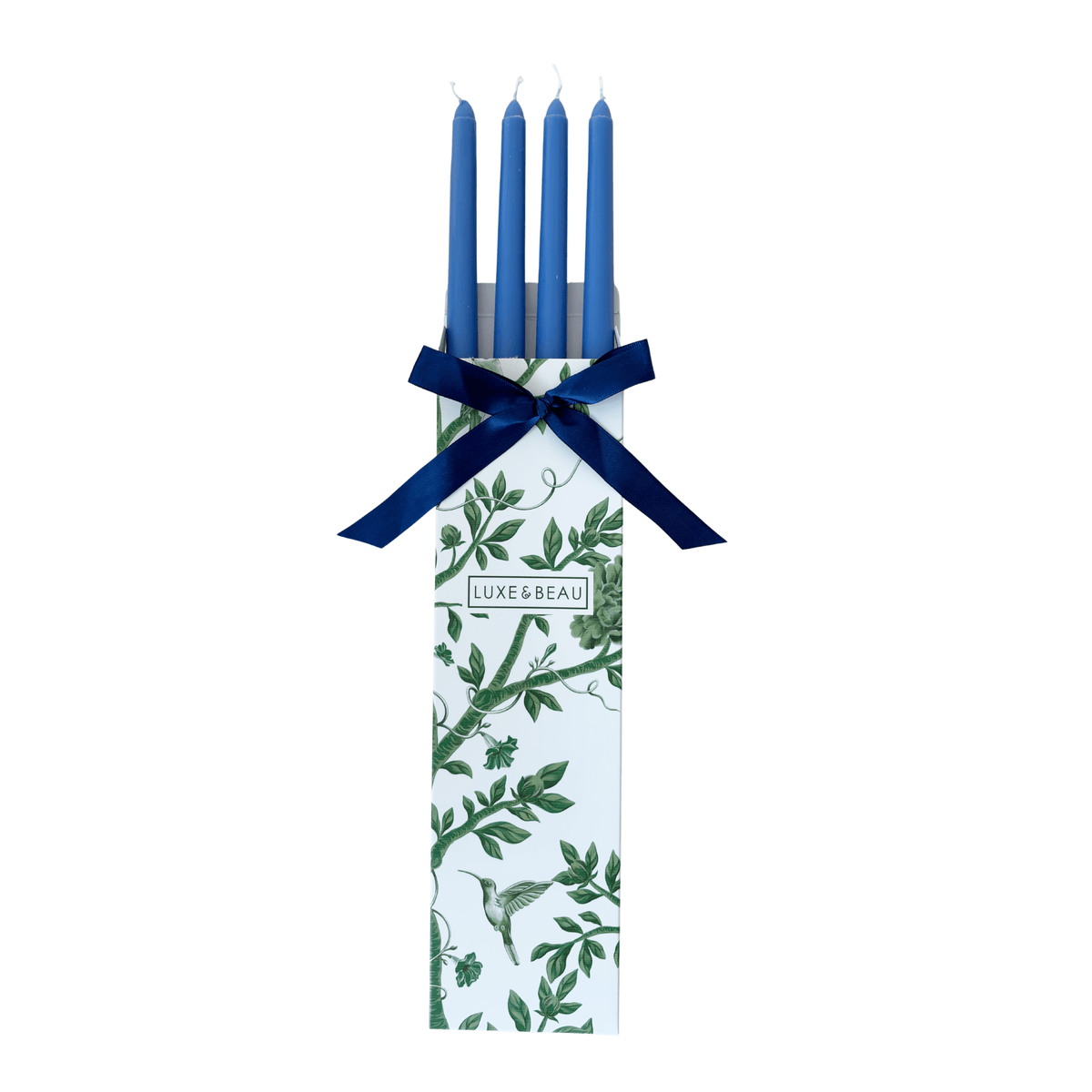 Set of four navy taper candles in a Luxe and Beau gift box with navy ribbon