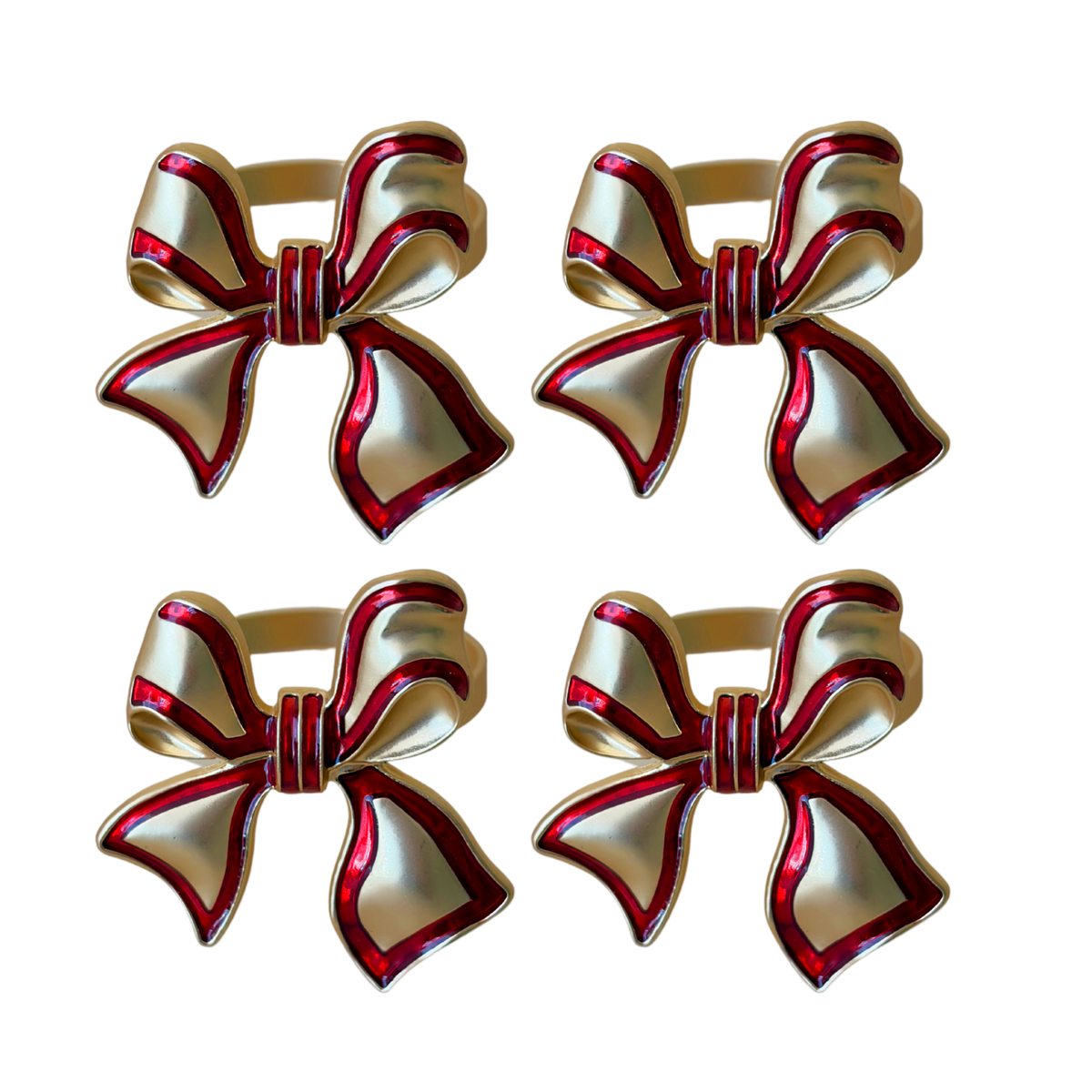 Set of four red enamel bow napkin rings