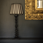 Spruce and Black Bow Christmas table styled with black stripe lamp shade and black lamp base