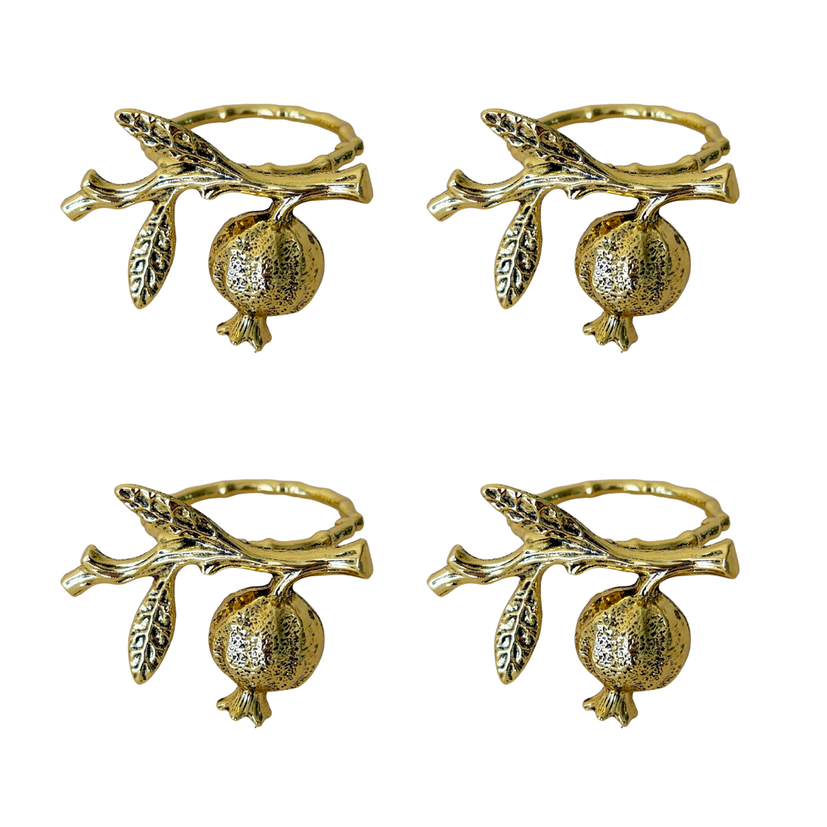 Set of four gold pomegranate napkin rings