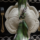 Spruce and Black Bow Christmas table styled with white cabbage plates, silver deer napkin rings and Spruce and Black Bow napkins