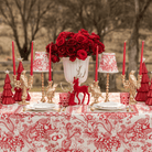 Red Toile Christmas table styled with Red Toile table cloth, Red Toile lamp shade and gold bird double candle holder