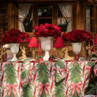 Spruce and Red Bow Christmas table styled with Spruce and Red Bow table cloth, Spruce and Red Bow napkins and gold bow lamp