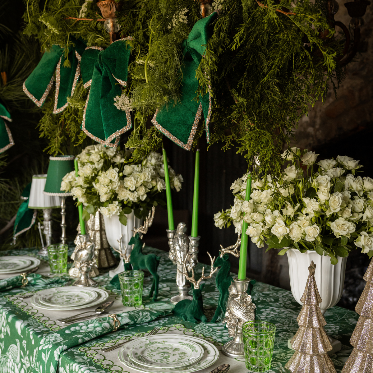 Green Toile Christmas table styled with Green Toile table cloth, Green Toile napkins and green velvet glitter trim bows
