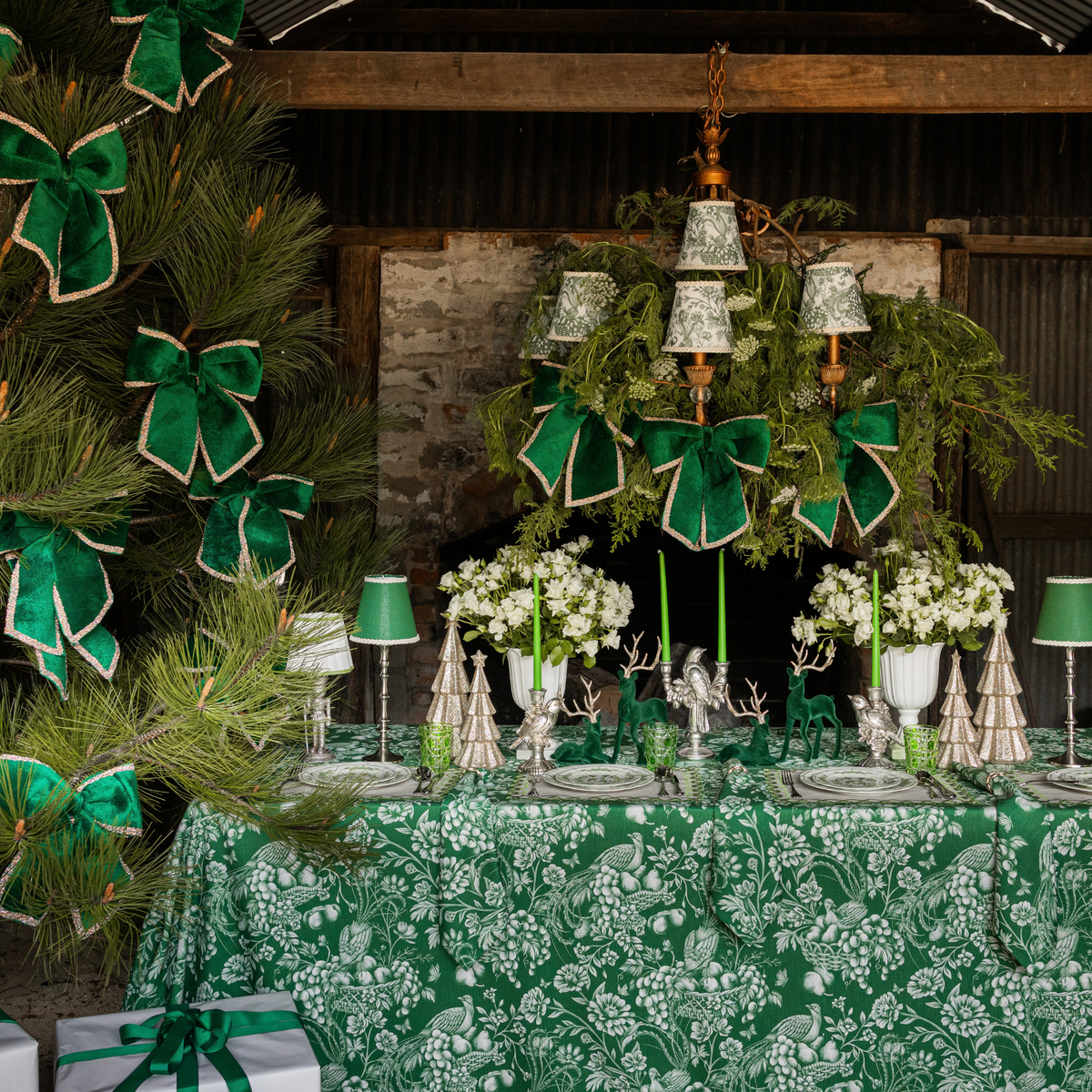 Green Toile Christmas table styled with Green Toile table cloth and green velvet glitter trim bows