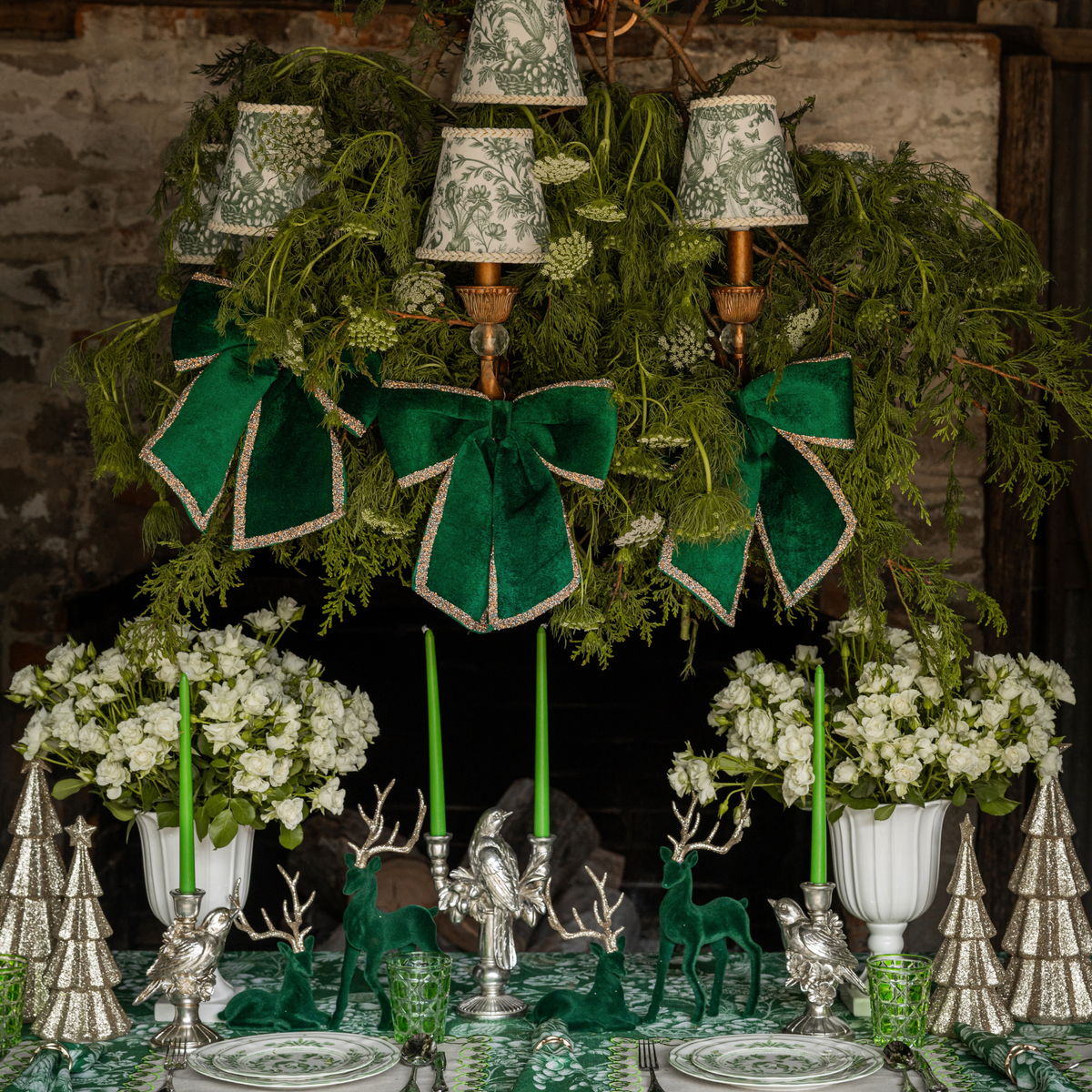 Green Toile Christmas table styled with green velvet glitter trim bows, Green Toile lamp shade and silver bird double candle holder