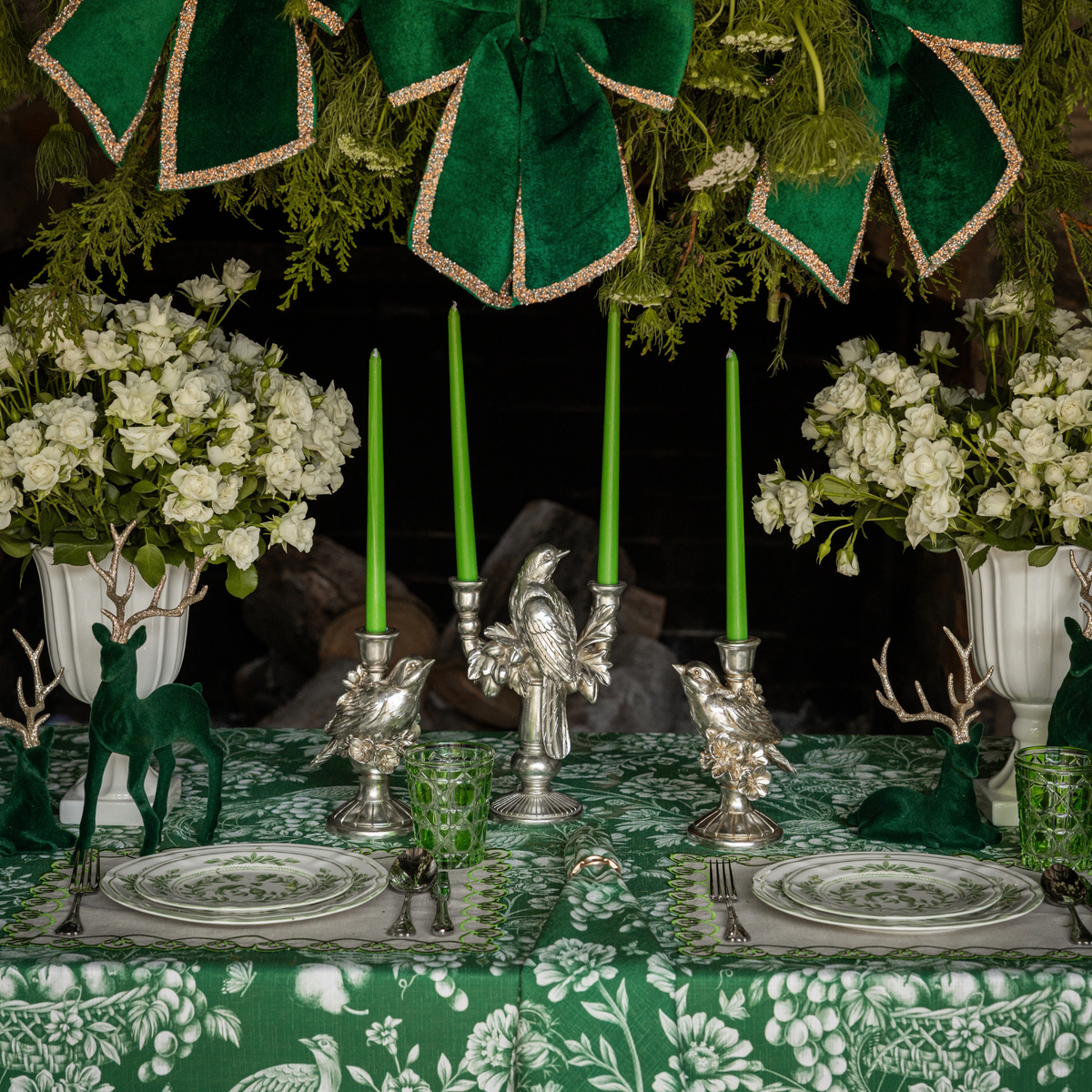 Green Toile Christmas table styled with silver bird double candle holder and silver bird candle holders