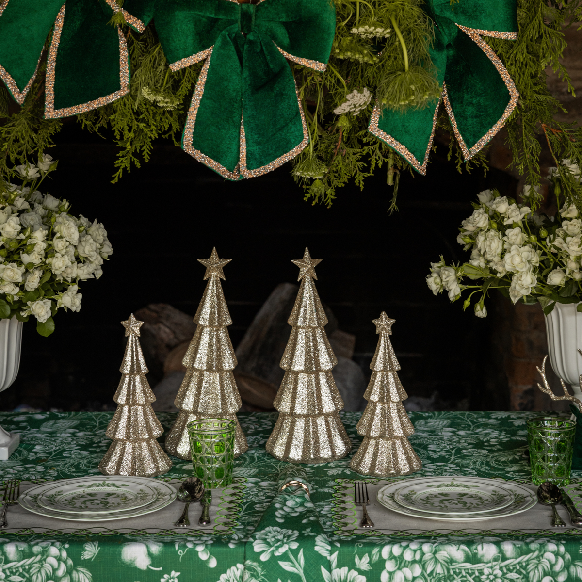 Green Toile Christmas table styled with champagne glitter Christmas trees