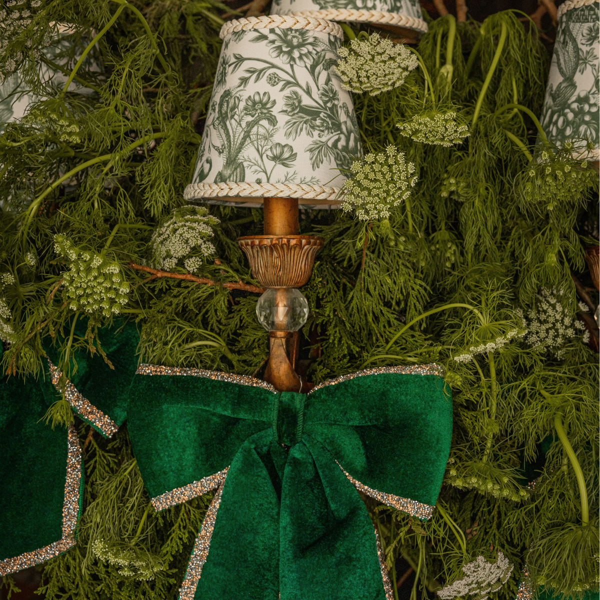 Green Toile Christmas table styled with Green Toile lamp shade and green velvet glitter trim bows