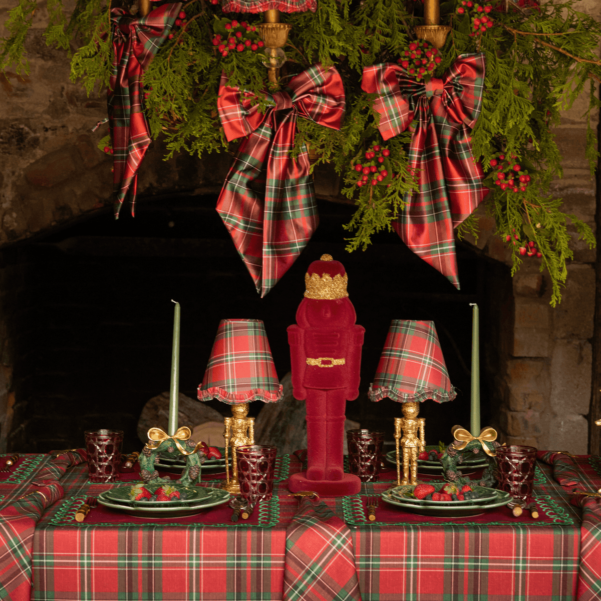 Red Tartan Christmas table styled with burgundy velvet nutcracker, gold nutcracker lamp and Red Tartan ruffle lamp shade