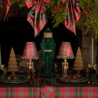 Red Tartan Christmas table styled with dark green velvet nutcracker, gold nutcracker lamp and Red Tartan ruffle lamp shade