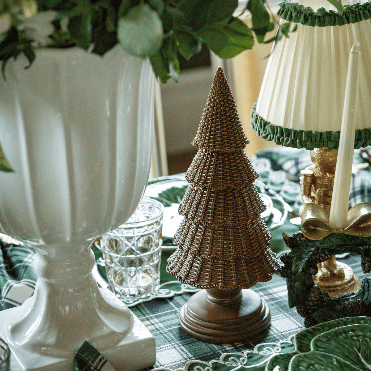Green and Black Plaid Christmas table styled with dark brown rattan Christmas trees