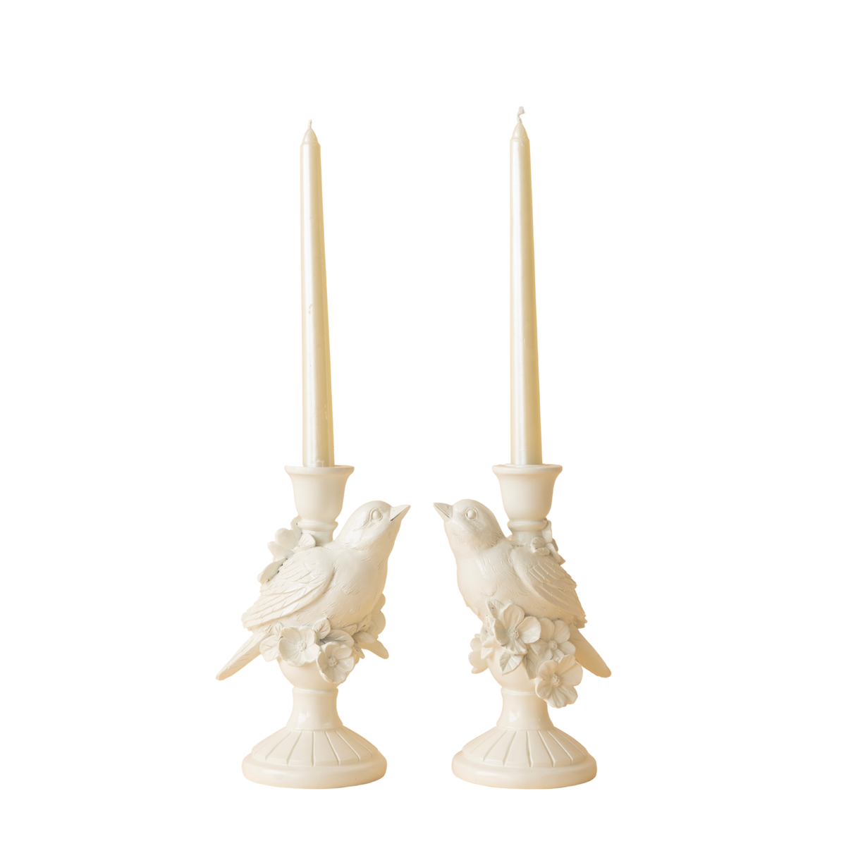 Pair of white bird candle holders with taper candles