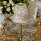 Gold Toile Christmas table styled with Gold Toile lamp shade and gold hammered lamp base