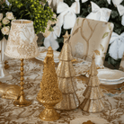 Gold Toile Christmas table styled with Gold Toile lamp shade and gold hammered lamp base