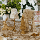 Gold Toile Christmas table styled with Gold Toile lamp shade and gold hammered lamp base