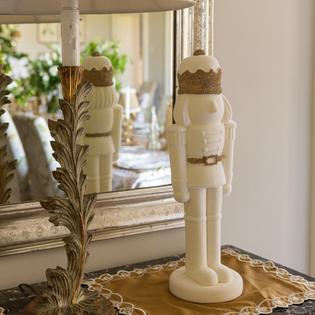 Gold Toile Christmas table styled with cream velvet nutcracker